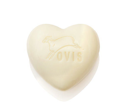 Heart-shaped white soap with embossed sheep and "OVIS."