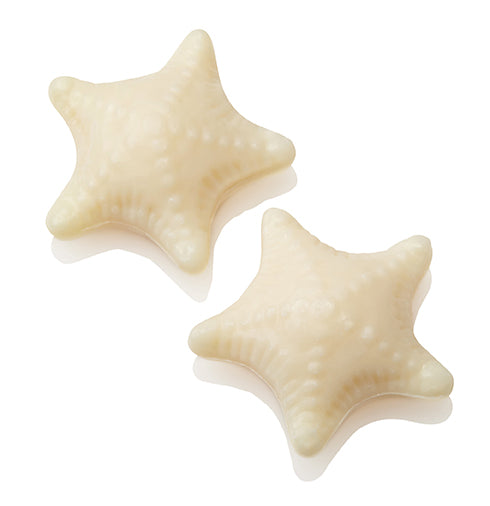 Starfish-shaped, off-white textured soap.