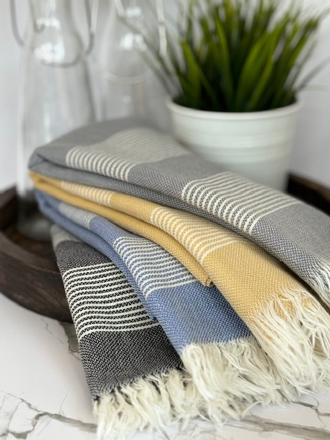 Anza Amber Turkish Hand Towel in various color on wooden tray