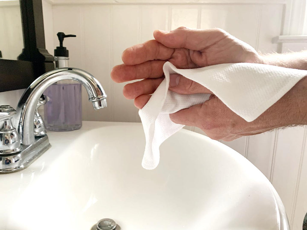 Drying hands with Handecloth White Reusable Paper Towel