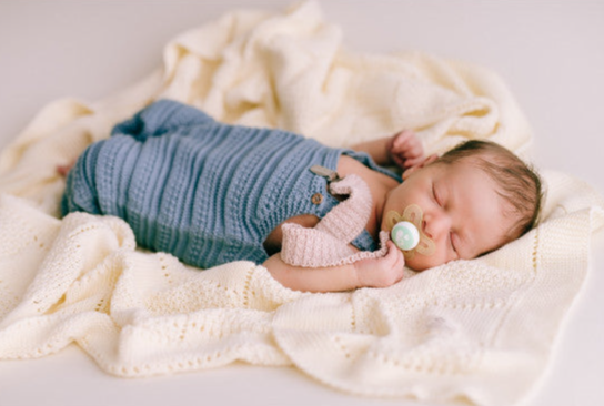 Sleeping Baby in Micu Micu Links Jeans Romper and Ecru Plaid Baby 