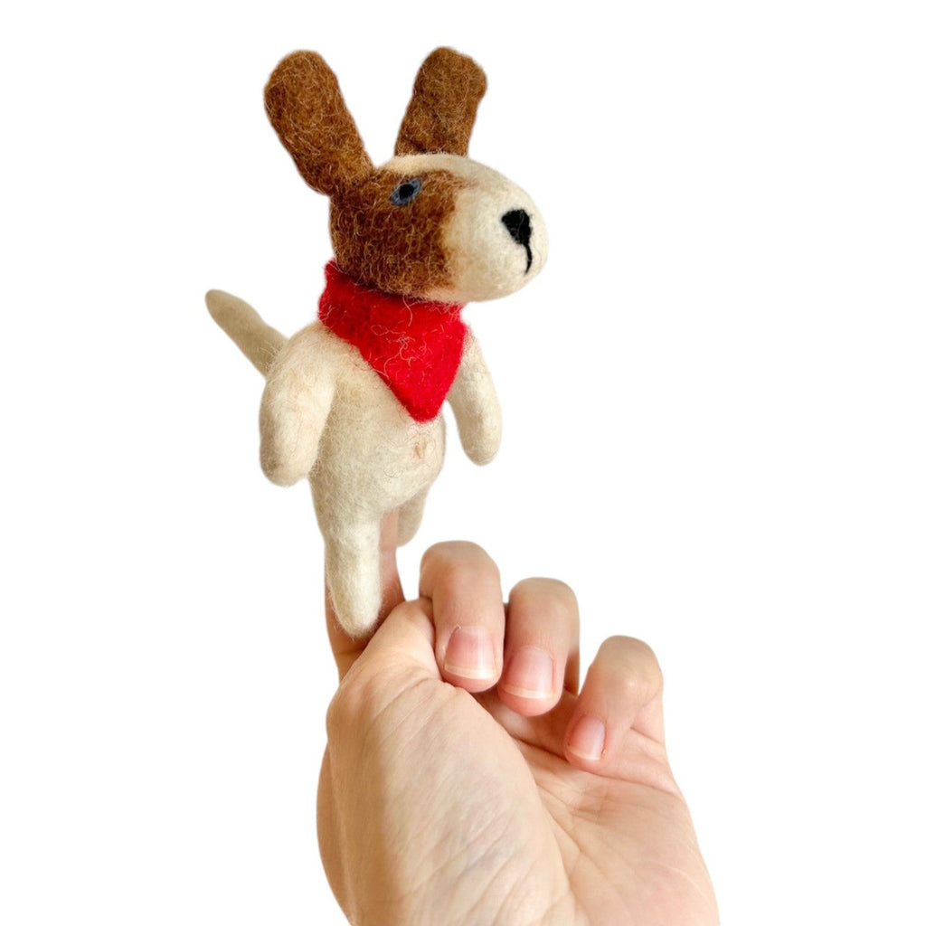 Nacha Interior Dog Finger Puppet on finger