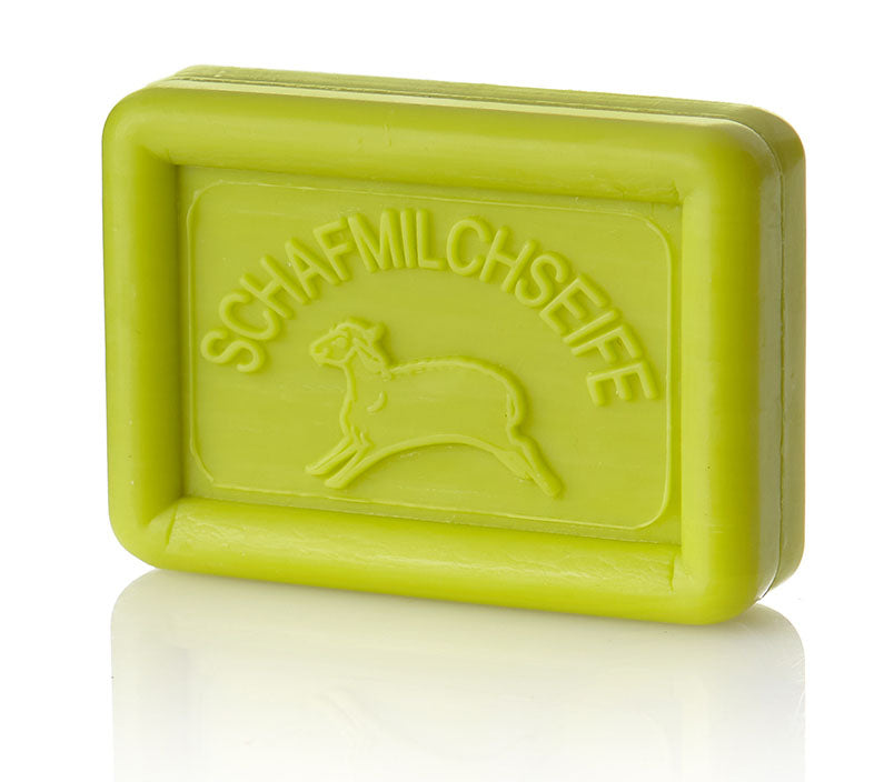 Rectangular lime green soap bar with a sheep and "SCHAFMILCHSEIFE" embossed on it.