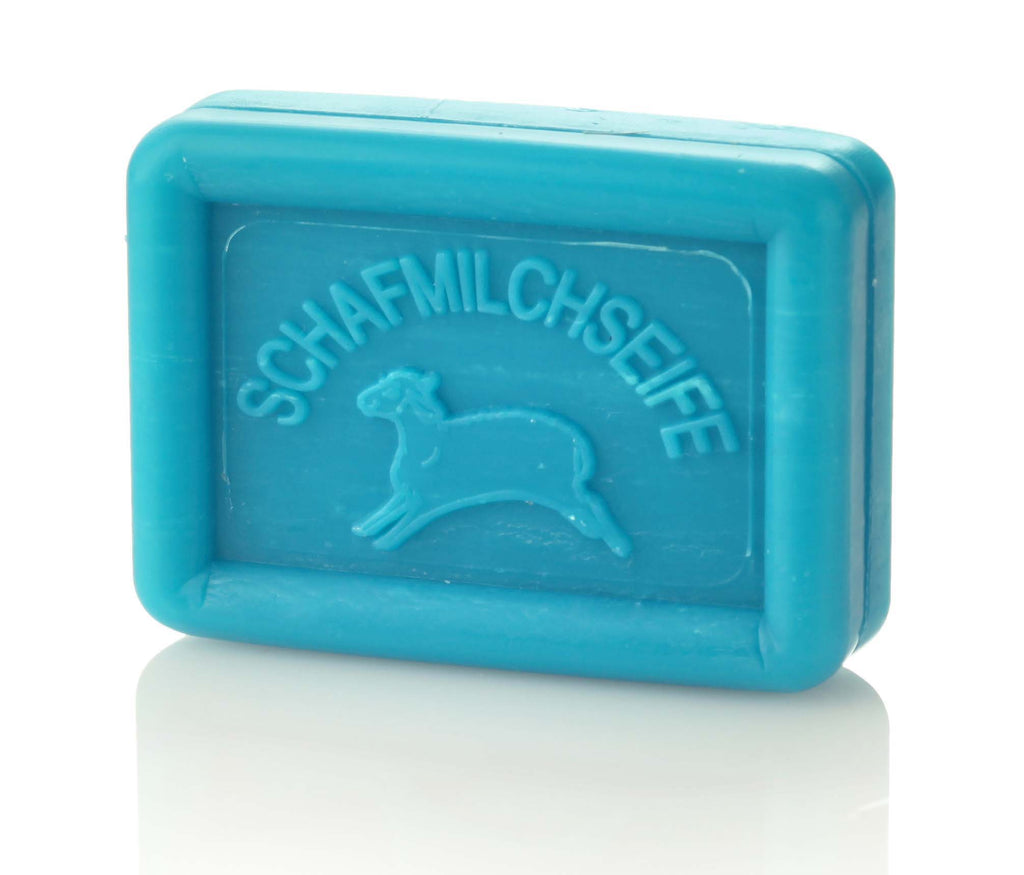 Rectangular blue soap bar with a sheep and "SCHAFMILCHSEIFE" embossed on it.