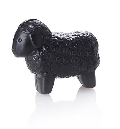 Black sheep-shaped soaps with textured wool pattern.