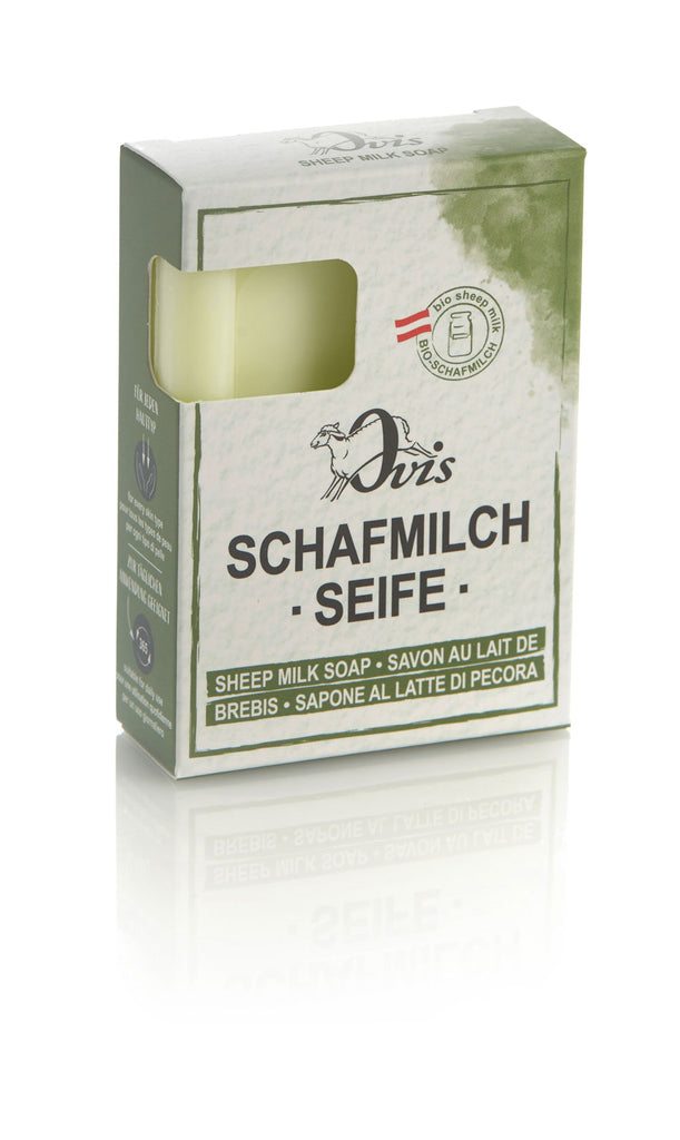 Box of Ovis sheep milk soap with part of the light lime green soap bar visible.