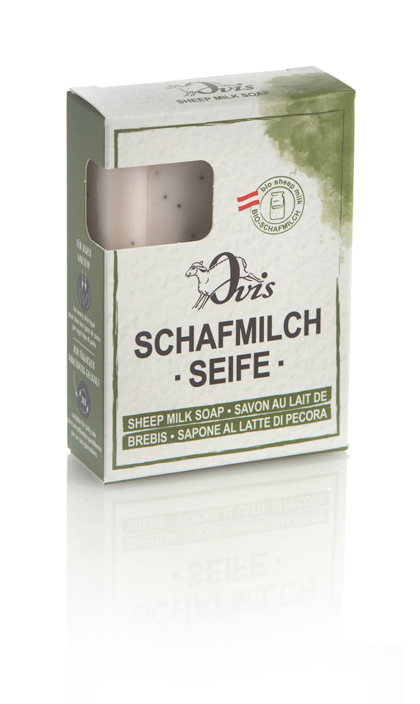 Box of Ovis sheep milk soap with part of the beige soap bar visible.
