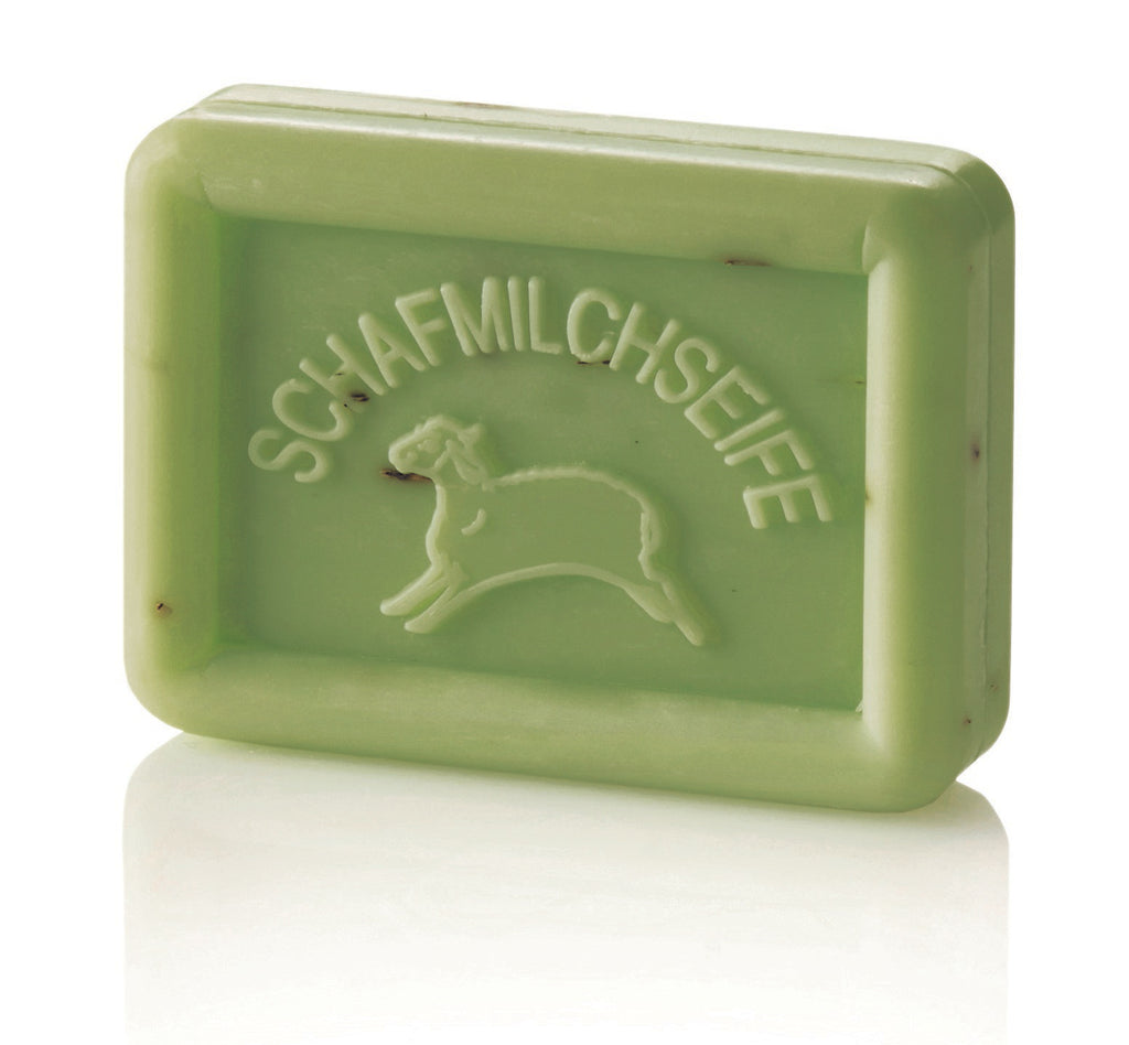 Rectangular light green soap bar with a sheep and "SCHAFMILCHSEIFE" embossed on it.