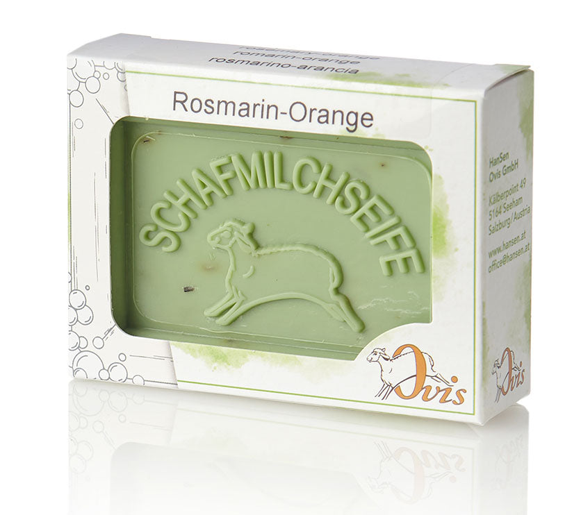 Box of Ovis sheep milk soap with part of the light green soap bar visible.