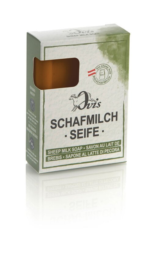 Box of Ovis sheep milk soap with part of the brown soap bar visible.