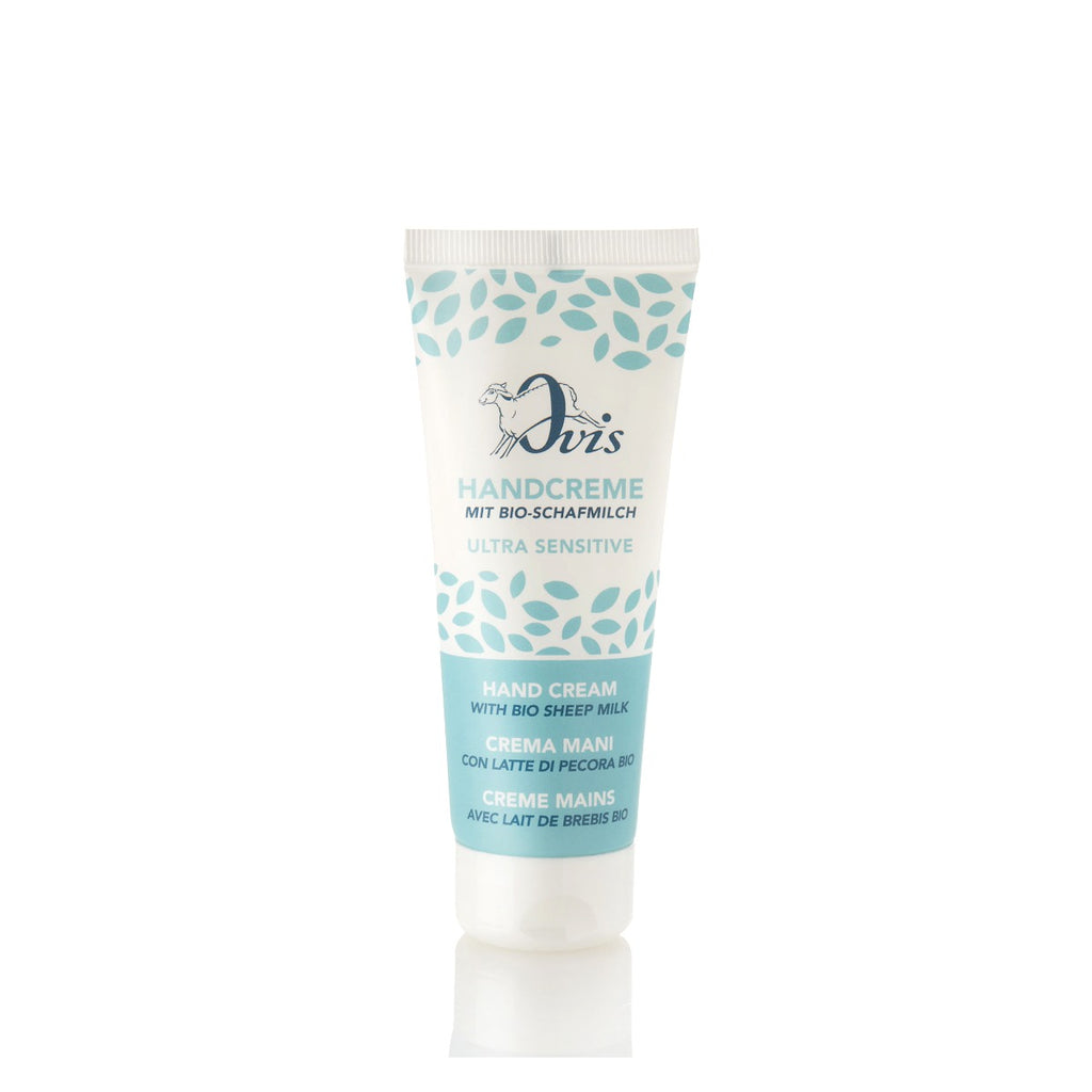 A tube of hand cream featuring a blue leaf pattern and a sheep logo.