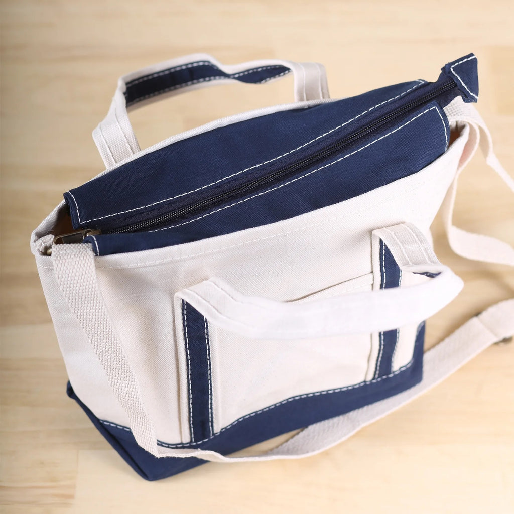 ShoreBags Sonoma Canvas Crossbody Tote bag with a zipper and sturdy handles.